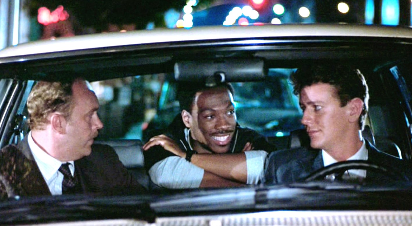 Eddie Murphy, Judge Reinhold, and John Ashton in Beverly Hills Cop (1984)